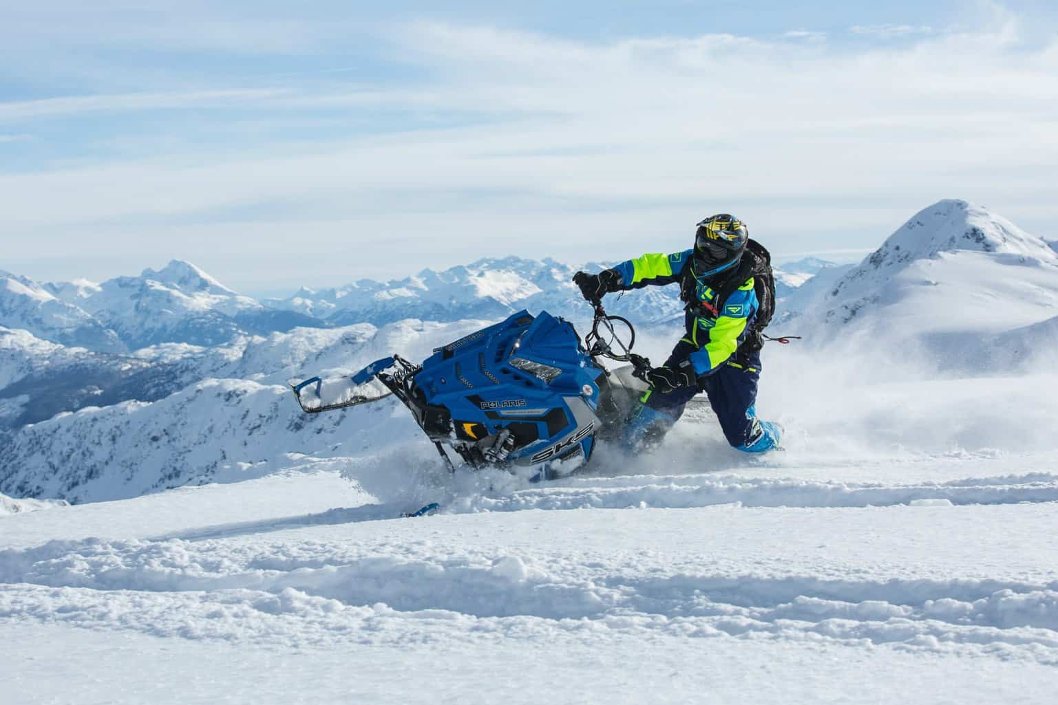 Snowmobiler riding in the west coast